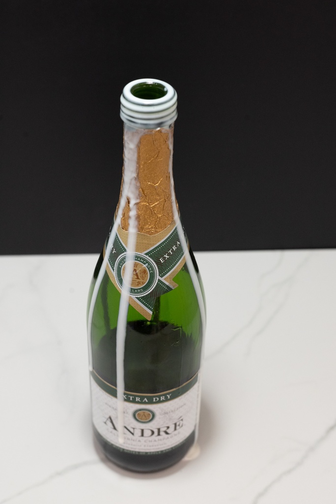 Half Filled Champagne Bottle