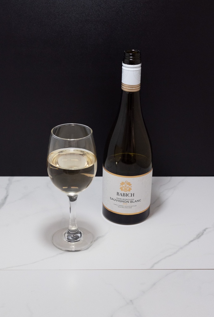 Half Filled White Wine Bottle