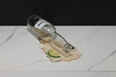 Spilled Beer Bottle with Lime