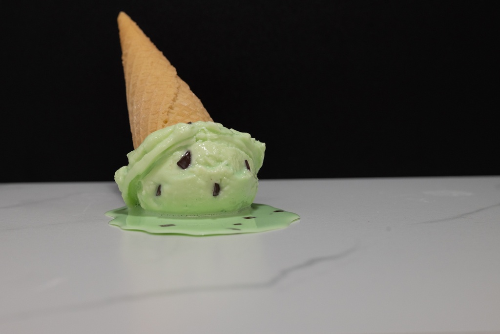 Melting Mint Chocolate Chip Ice Cream Cone
