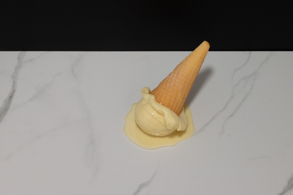Melting Vanilla Ice Cream Cone