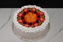 Large Vanilla Frosted Cake Topped with Fruit