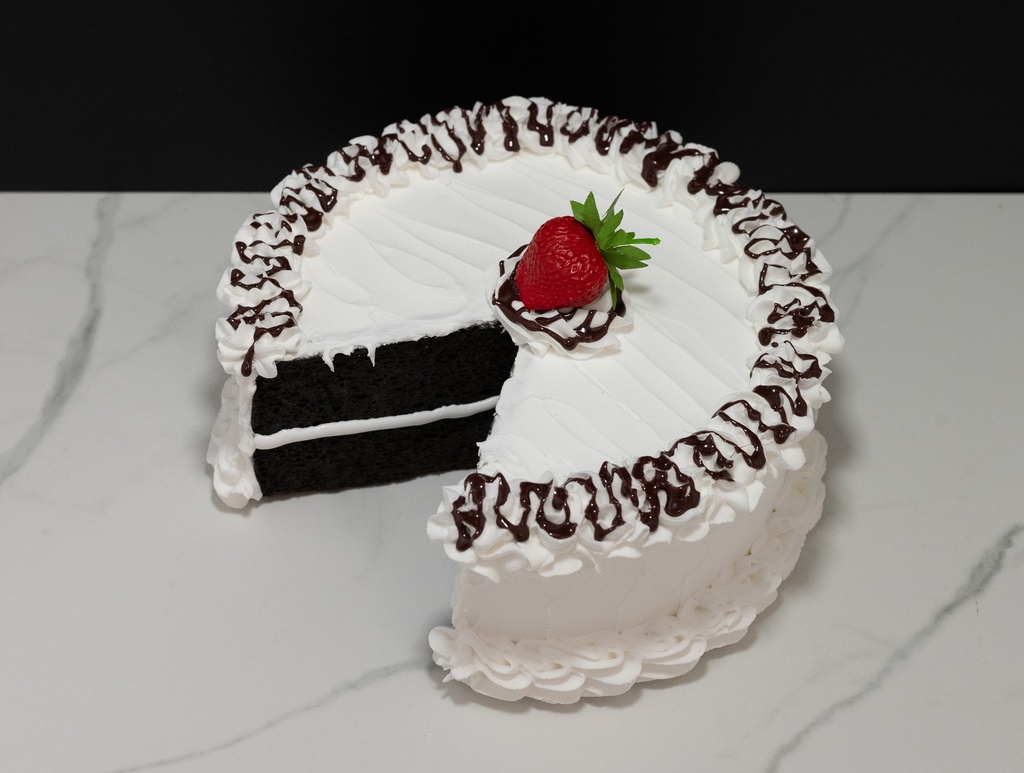 Large Vanilla Frosted Cake with Missing Slice