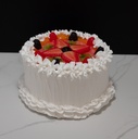 Small Vanilla Frosted Cake Topped with Fruit