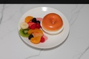 Plated Bagel with Cream Cheese and Fruit