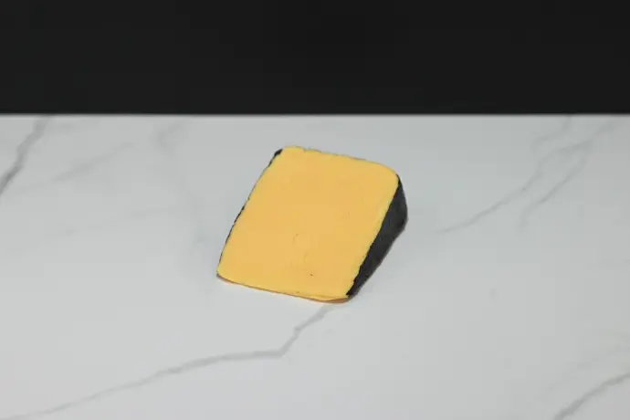Cheddar Cheese Wedge with Black Rind