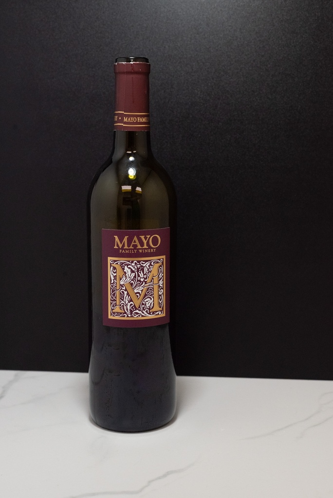 Half Filled Red Wine Bottle