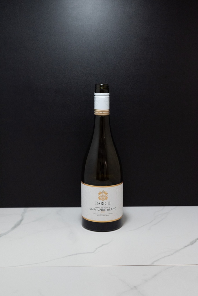 Half Filled White Wine Bottle