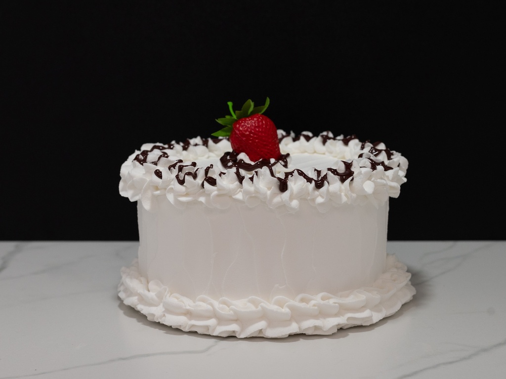 Small Vanilla Frosted Cake