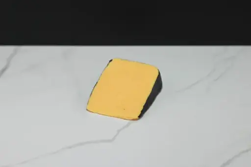 [947] Cheddar Cheese Wedge with Black Rind