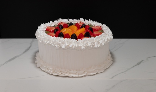 [308] Large Vanilla Frosted Cake Topped with Fruit