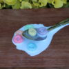 SPOON IN MILK AND FRUIT LOOPS CU